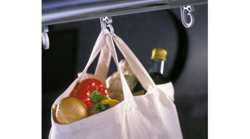 Bag holder, luggage compartment