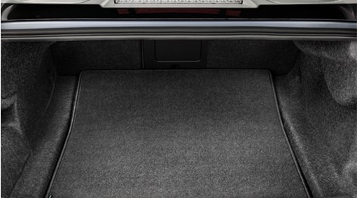 Reversible luggage compartment mat 